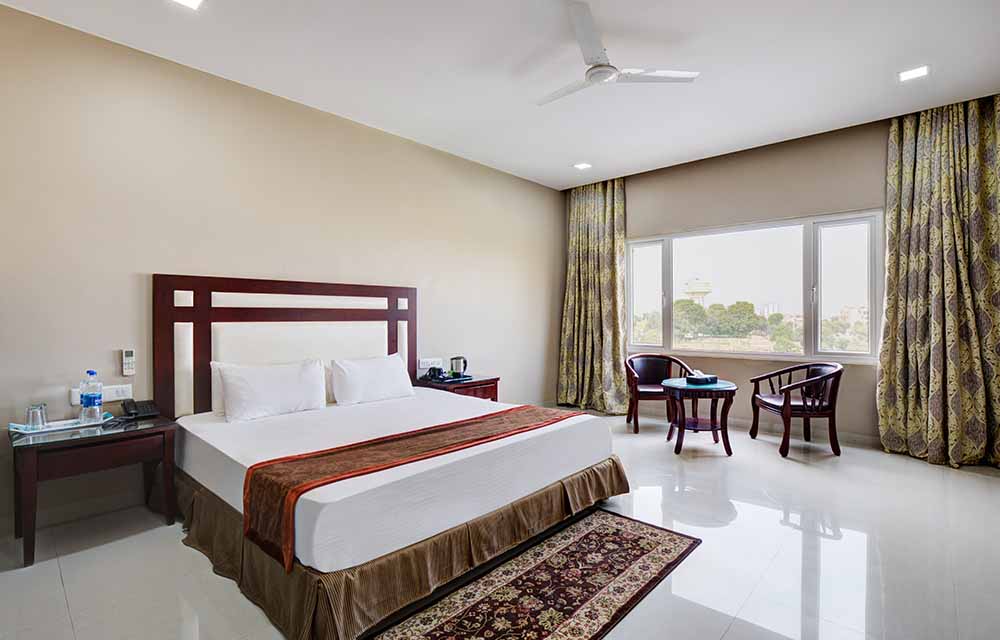 Deluxe Room | Rooms available at Srijan Seva Sadan the best affordable ...